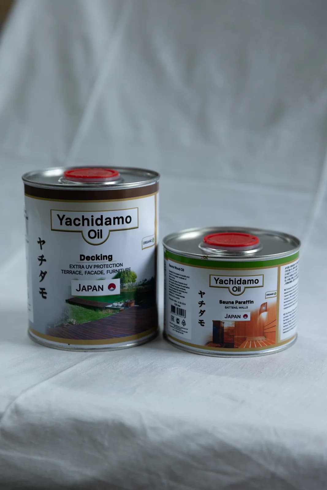 Две банки масла Yachidamo: для террасы и для бани