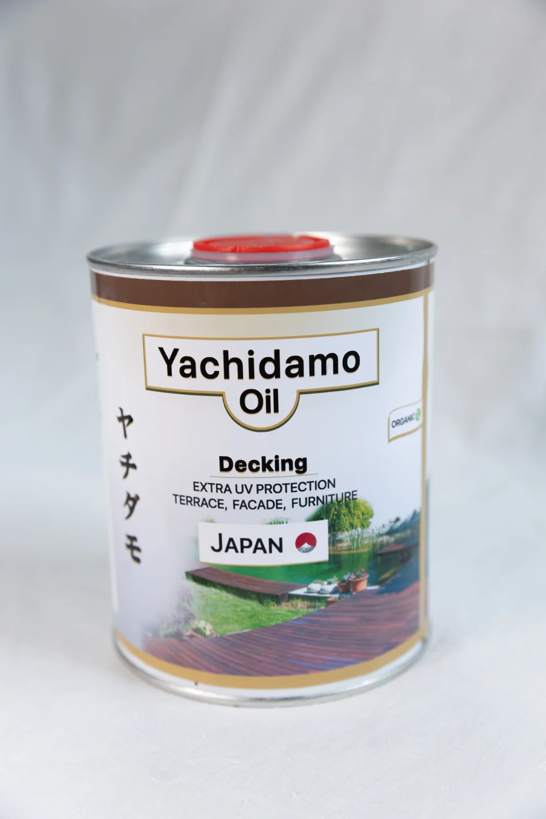 Одна банка Yachidamo Decking крупным планом: на этикетке terrace, facade, furniture и фото террасы у воды